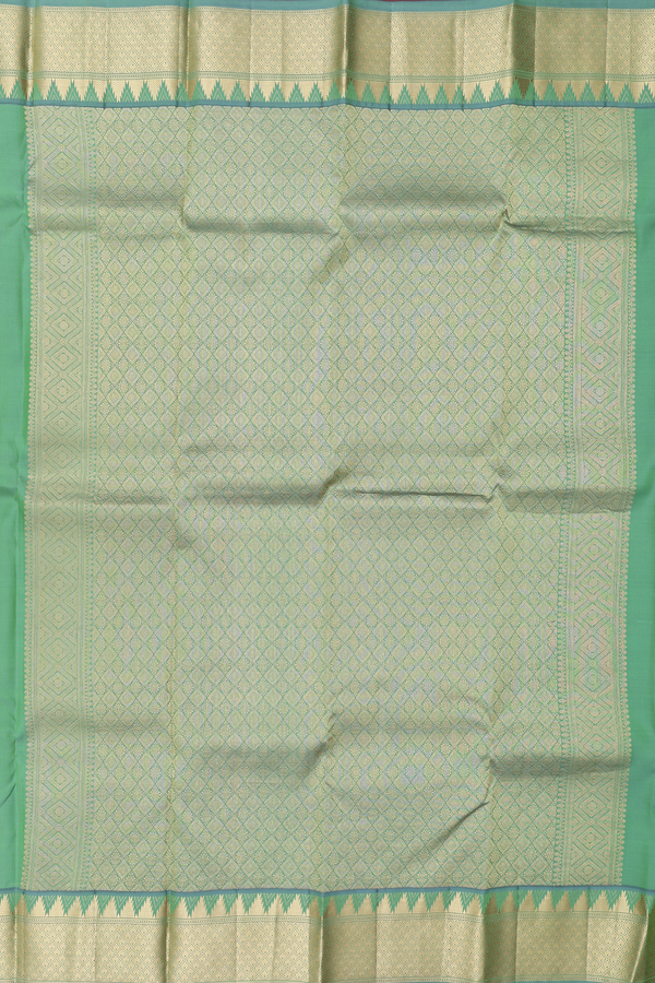 Kanchipuram Silk Saree In Green With Zari Buttis