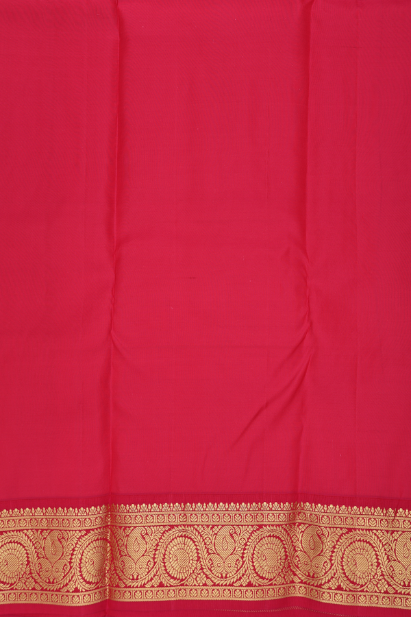 Kanchipuram Silk Saree In Plum Purple With Floral Buttas