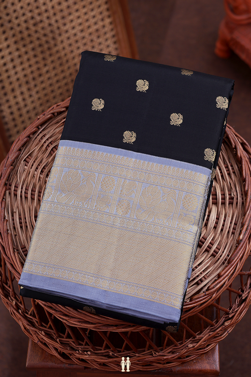 Kanchipuram Silk Saree In Black With Peacock Buttas