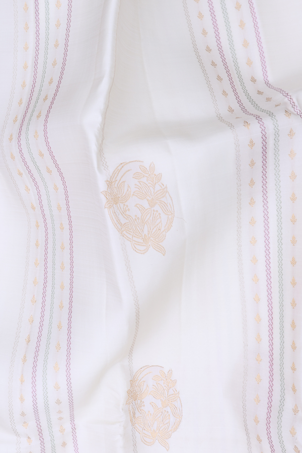 Kanchipuram Silk Saree In White Along Stripes With Buttas