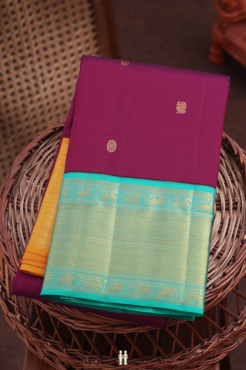 Kanchipuram Silk Saree In Burgundy Red With Peacock Buttas