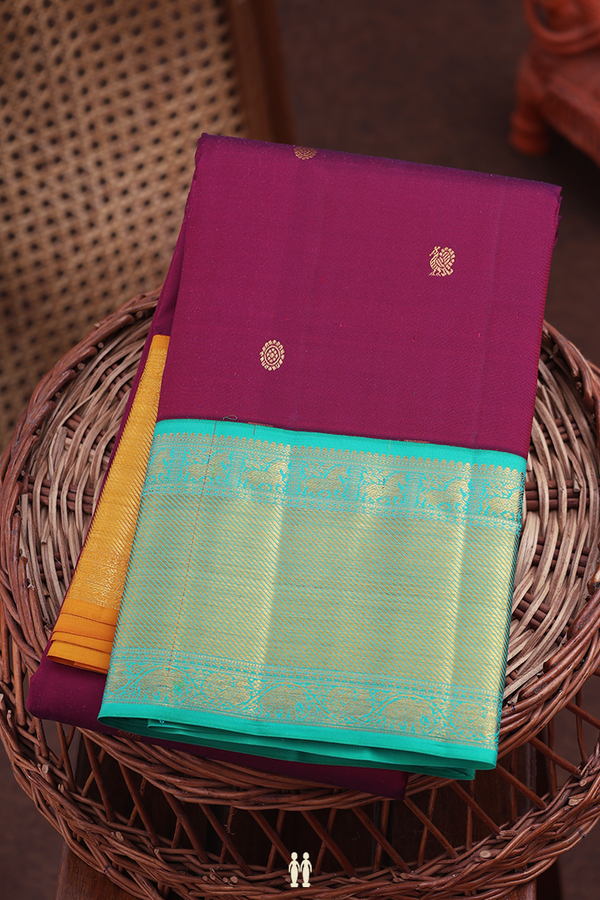 Kanchipuram Silk Saree In Burgundy Red With Peacock Buttas