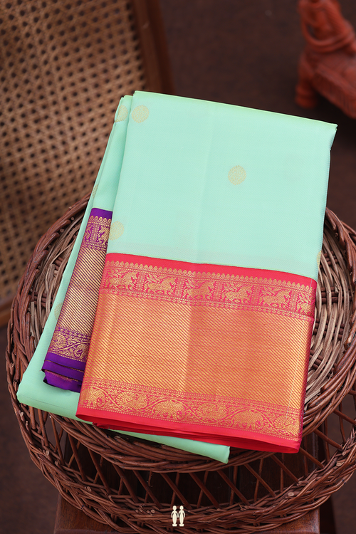 Kanchipuram Silk Saree In Mint Green With Chakram Buttas