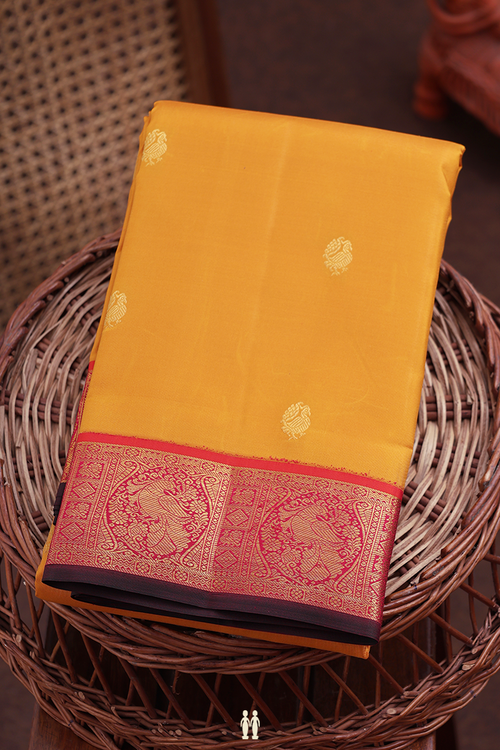 Kanchipuram Silk Saree In Yellow With Peacock Buttas