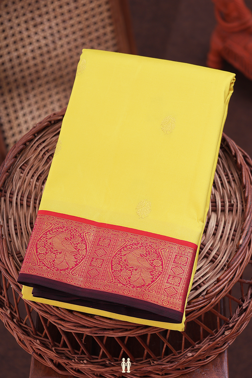 Kanchipuram Silk Saree In Yellow With Peacock Buttas
