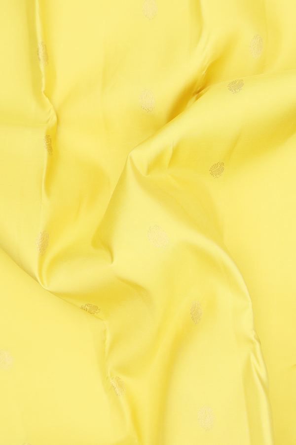 Kanchipuram Silk Saree In Yellow With Peacock Buttas
