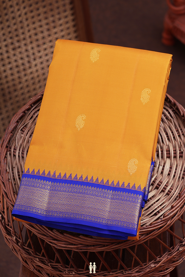 Kanchipuram Silk Saree In Yellow With Paisley Buttas