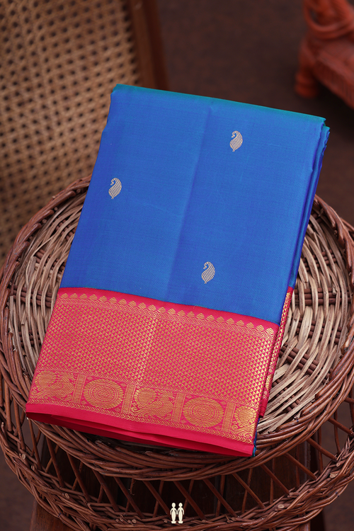 Kanchipuram Silk Saree In Peacock Blue With Paisley Buttas