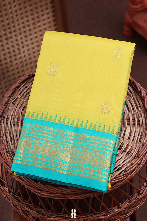 Kanchipuram Silk Saree In Yellow With Chakram Buttas