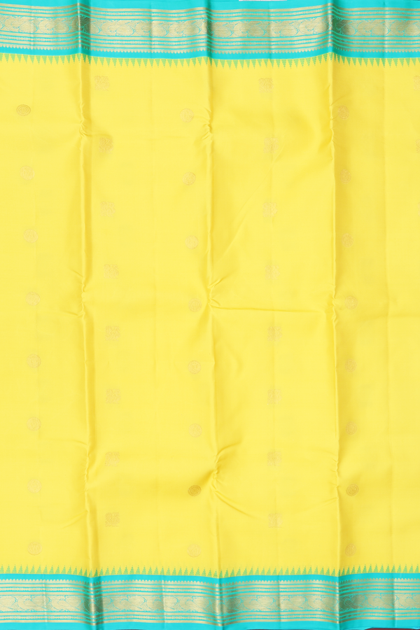 Kanchipuram Silk Saree In Yellow With Chakram Buttas
