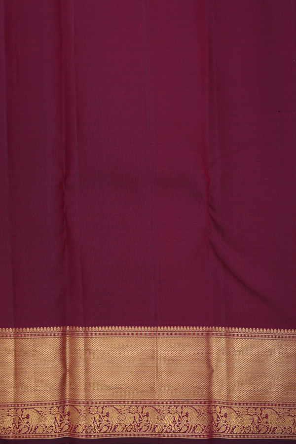 Kanchipuram Silk Saree In Maroon Along Checks With Buttas