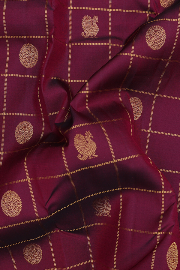 Kanchipuram Silk Saree In Maroon Along Checks With Buttas