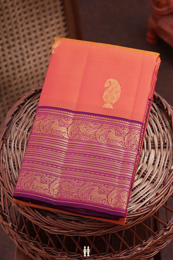 Kanchipuram Silk Saree In Coral Orange With Paisley Buttas