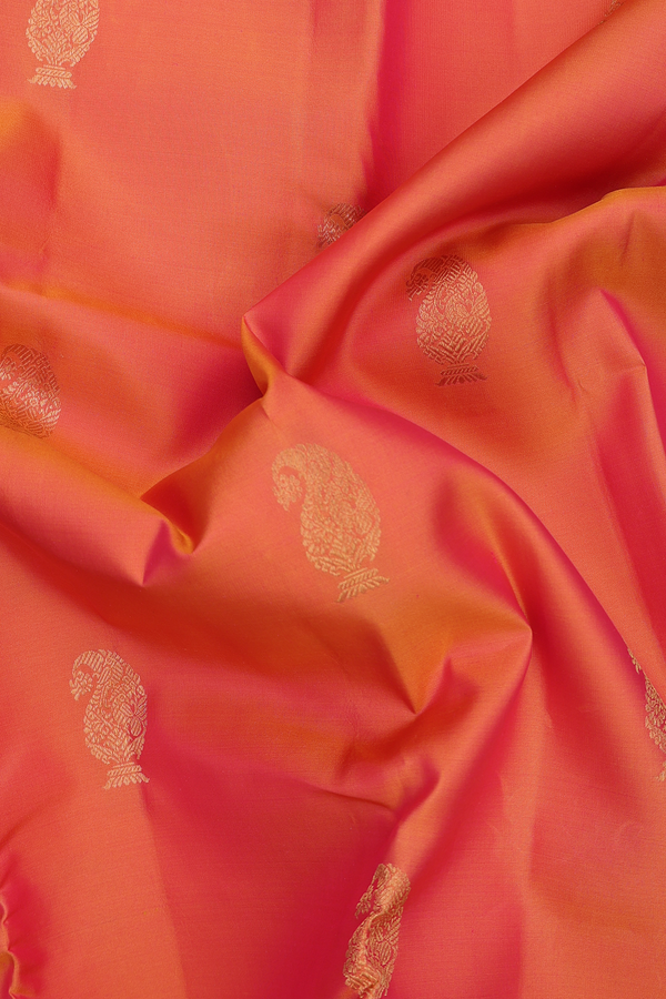 Kanchipuram Silk Saree In Coral Orange With Paisley Buttas
