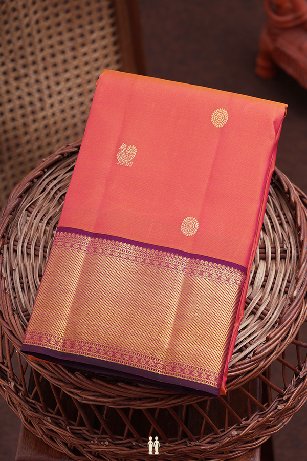 Kanchipuram Silk Saree In Coral Orange With Peacock Buttas