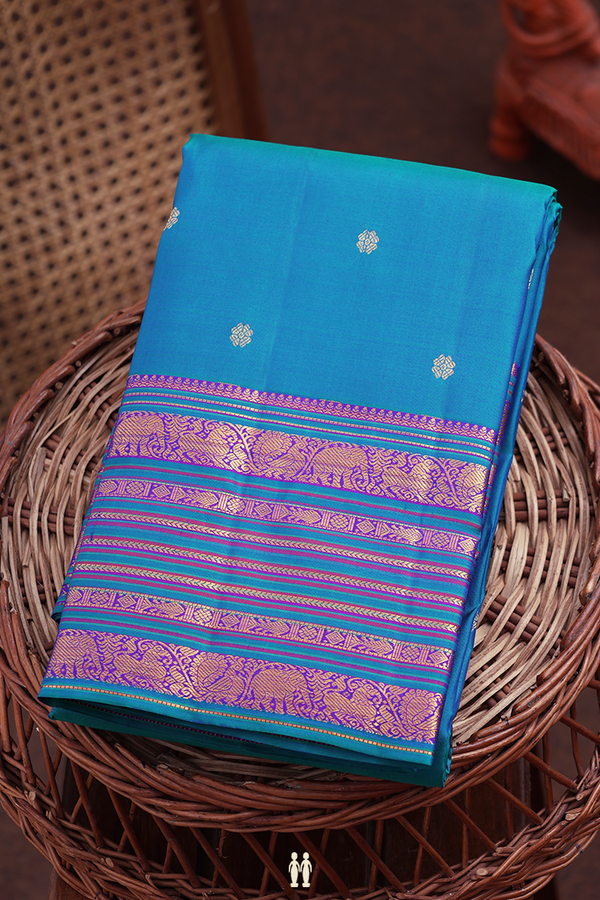 Kanchipuram Silk Saree In Capri Blue With Floral Buttas