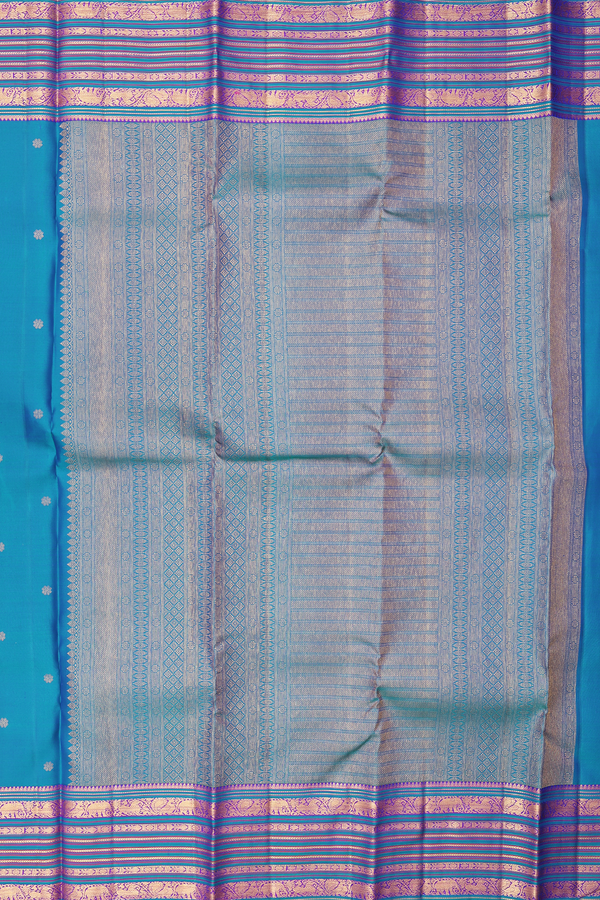 Kanchipuram Silk Saree In Capri Blue With Floral Buttas