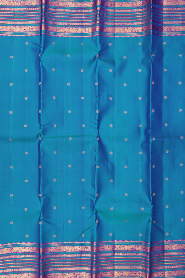 Kanchipuram Silk Saree In Capri Blue With Floral Buttas