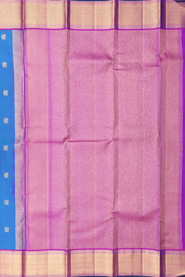 Kanchipuram Silk Saree In Capri Blue With Peacock Buttas