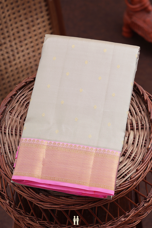 Kanchipuram Silk Saree In Dusty Cream With Zari Buttis