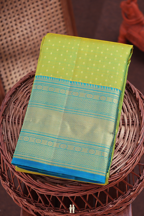 Kanchipuram Silk Saree In Parrot Green With Zari Buttis