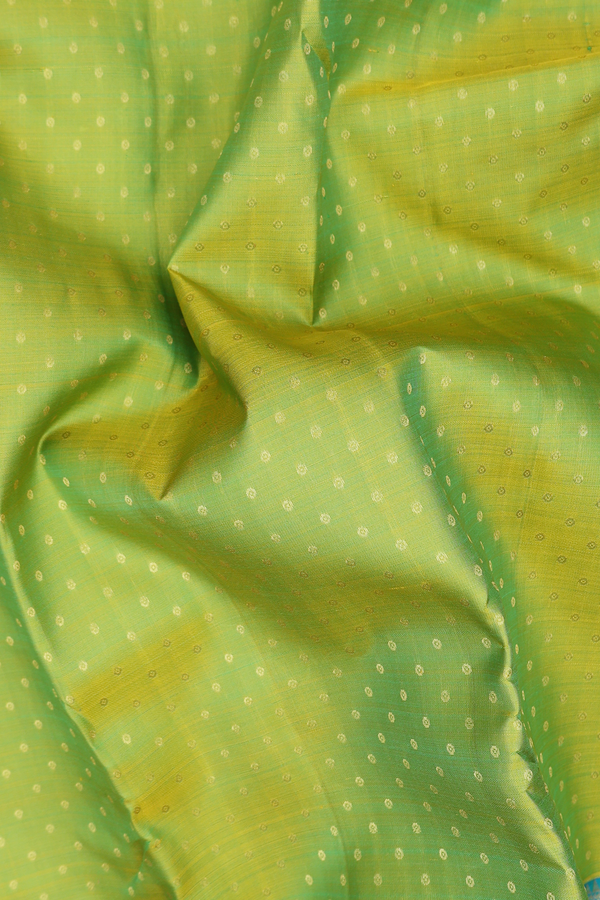 Kanchipuram Silk Saree In Parrot Green With Zari Buttis