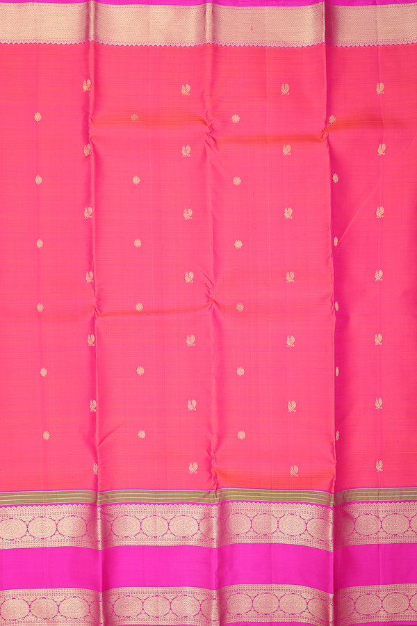 Kanchipuram Silk Saree In Coral Pink With Peacock Buttas