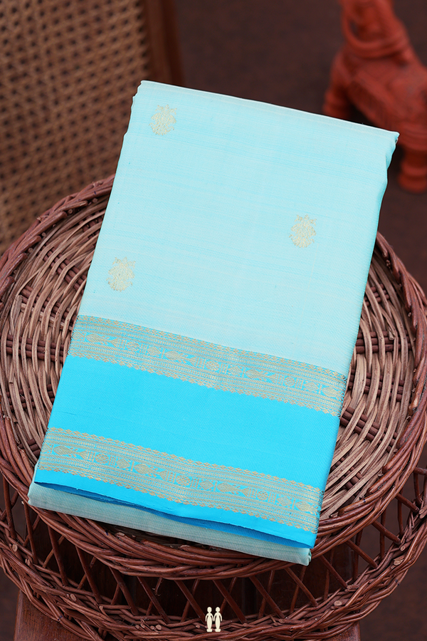 Kanchipuram Silk Saree In Blue With Iruthalai Pakshi Buttas