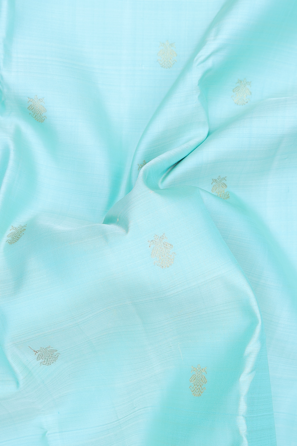 Kanchipuram Silk Saree In Blue With Iruthalai Pakshi Buttas