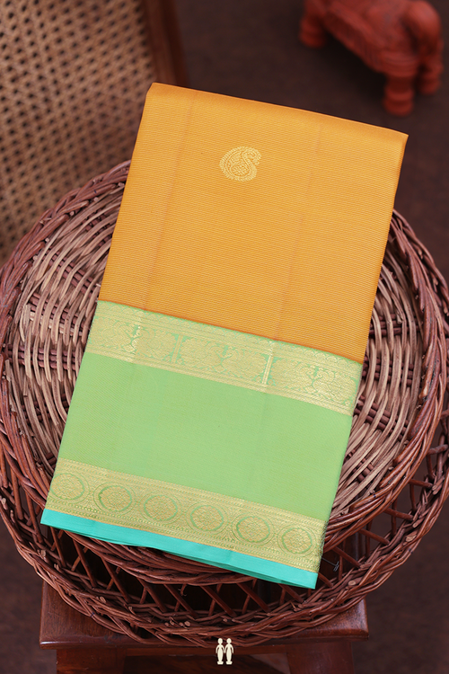 Kanchipuram Silk Saree In Yellow Along Stripes With Buttas