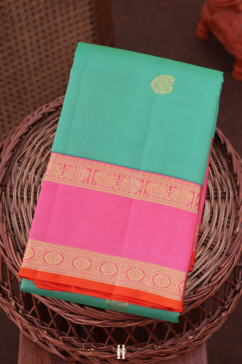 Kanchipuram Silk Saree In Green Along Stripes With Buttas