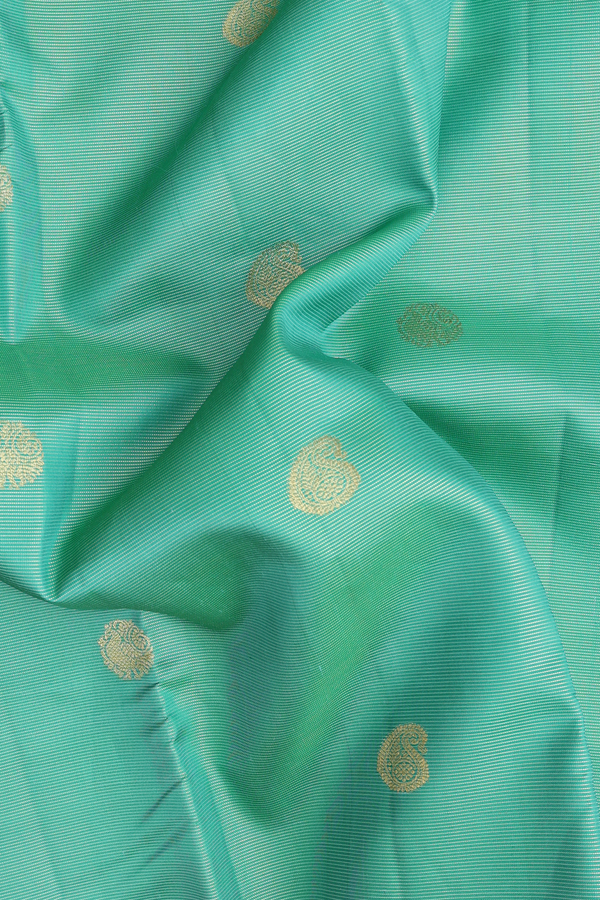 Kanchipuram Silk Saree In Green Along Stripes With Buttas