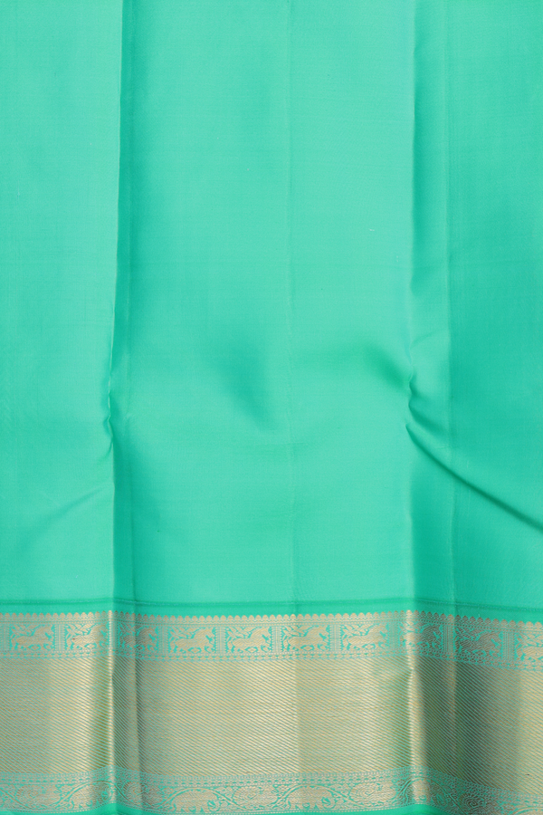 Kanchipuram Silk Saree In Rani Pink With Peacock Buttas