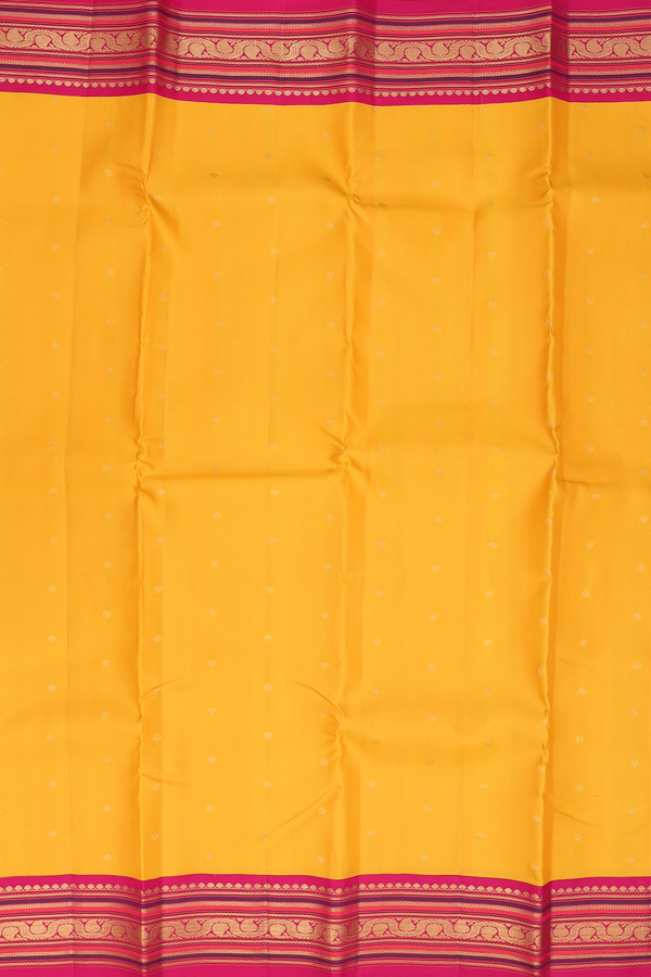 Kanchipuram Silk Saree In Saffron Yellow With Floral Buttis