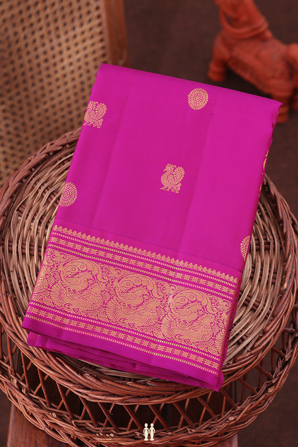Kanchipuram Silk Saree In Magenta With Peacock Buttas