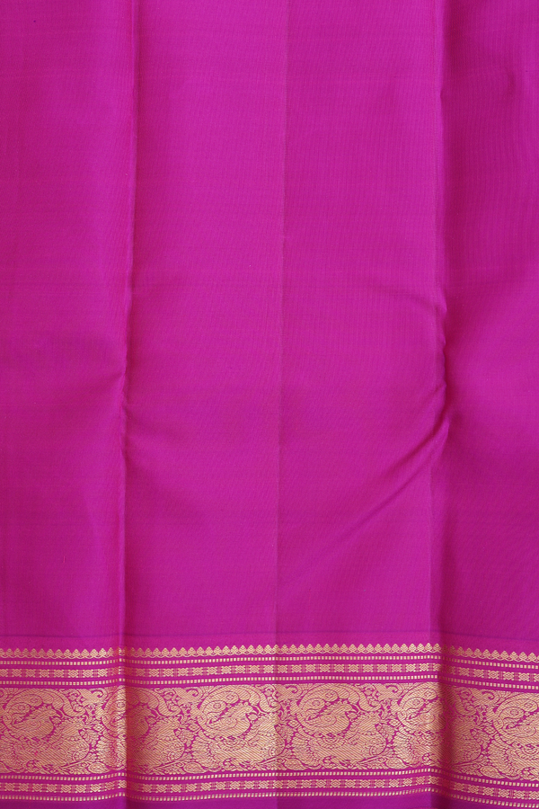 Kanchipuram Silk Saree In Magenta With Peacock Buttas