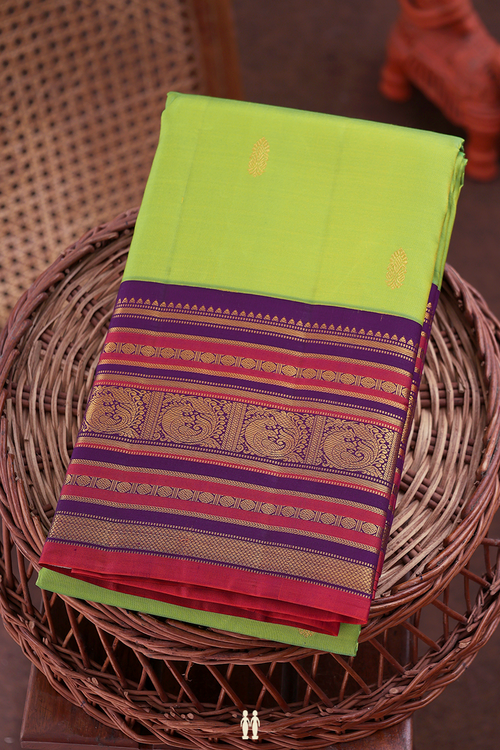 Kanchipuram Silk Saree In Lime Green With Paisley Buttis