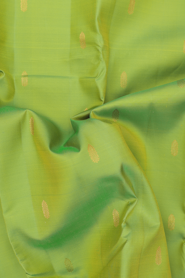 Kanchipuram Silk Saree In Lime Green With Paisley Buttis