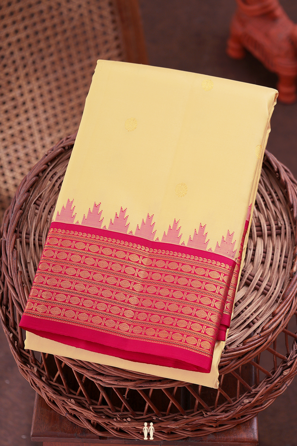 Kanchipuram Silk Saree In Caramel Yellow With Paisley Buttas