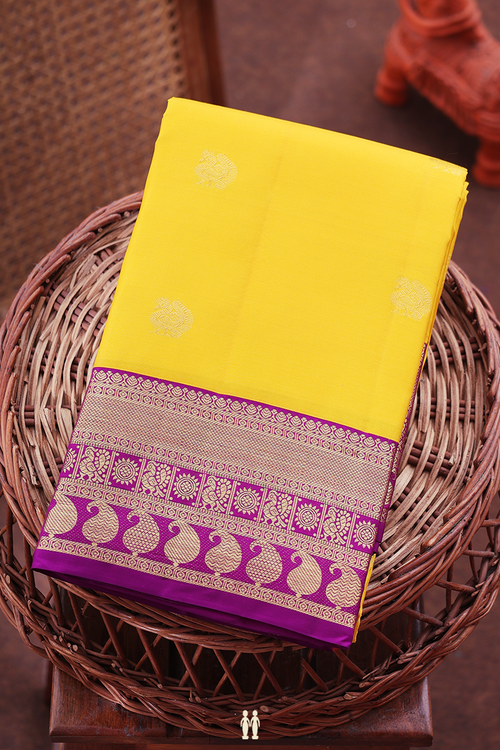 Kanchipuram Silk Saree In Yellow With Peacock Buttas
