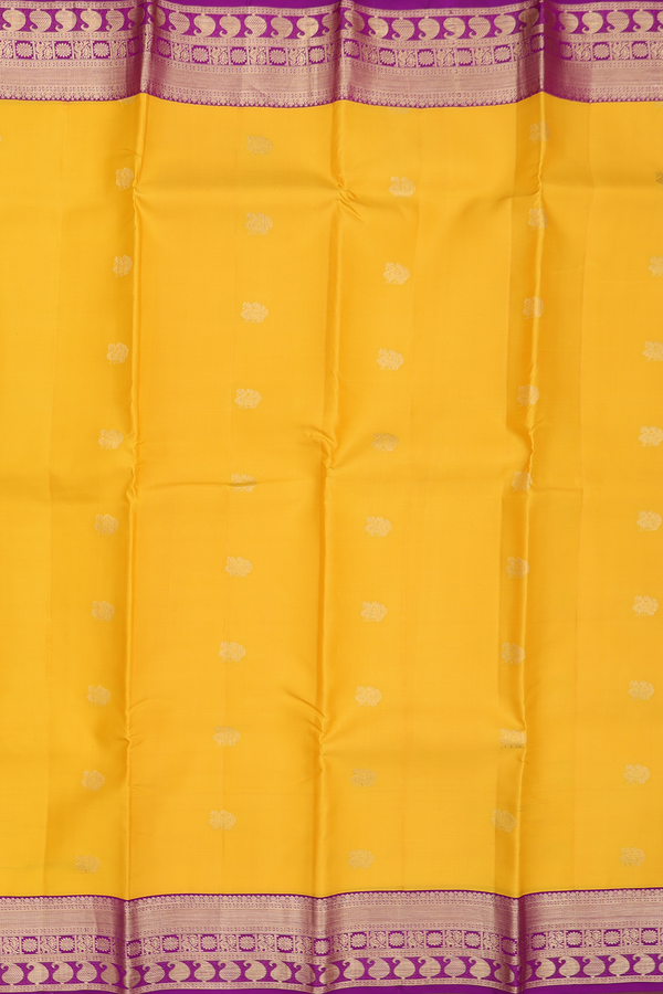 Kanchipuram Silk Saree In Yellow With Peacock Buttas