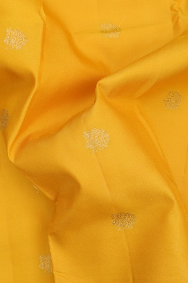 Kanchipuram Silk Saree In Yellow With Peacock Buttas