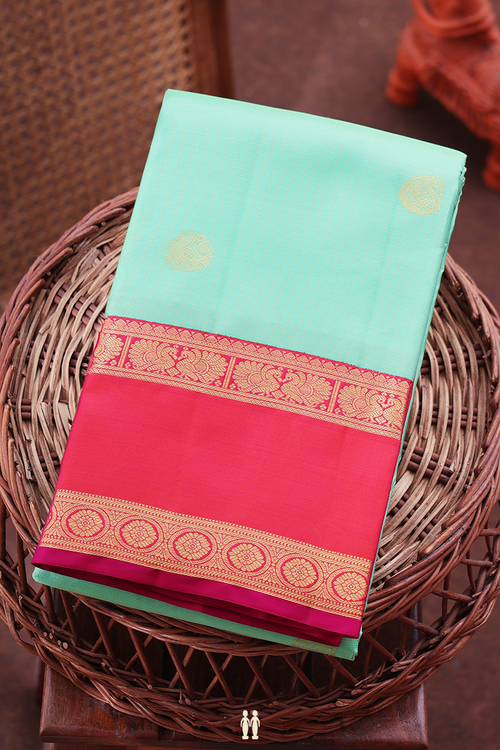 Kanchipuram Silk Saree In Green Along Stripes With Buttas