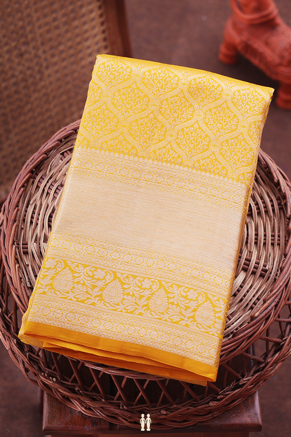 Kanchipuram Silk Saree In Saffron Yellow With Brocade Design