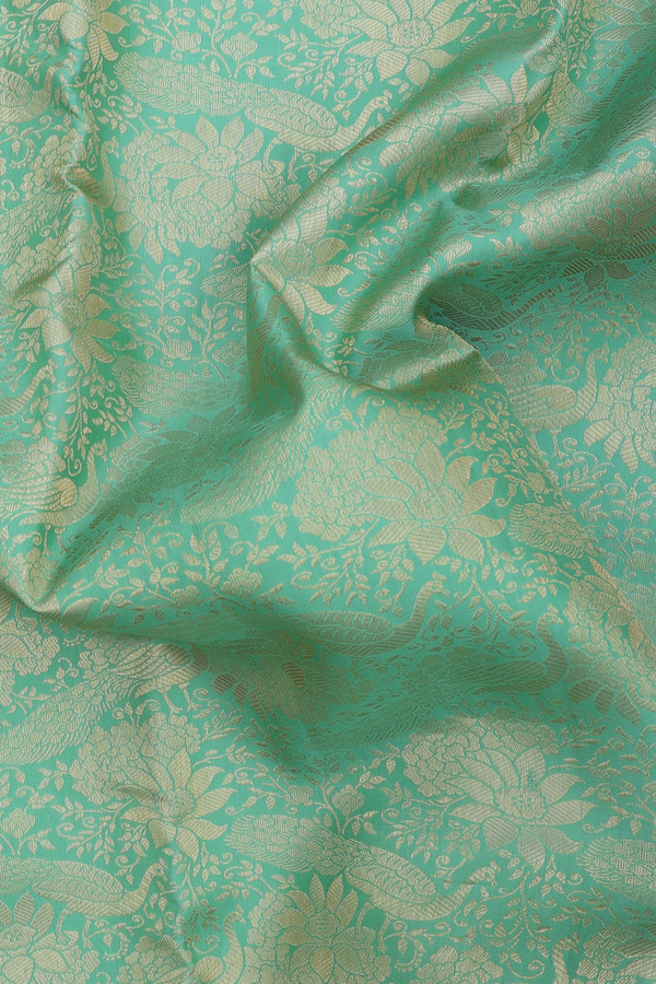Kanchipuram Silk Saree In Green With Peacock Design