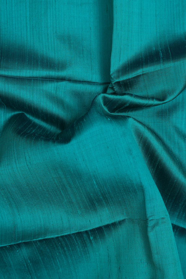 Raw Silk Saree In Plain Green With Zari Border