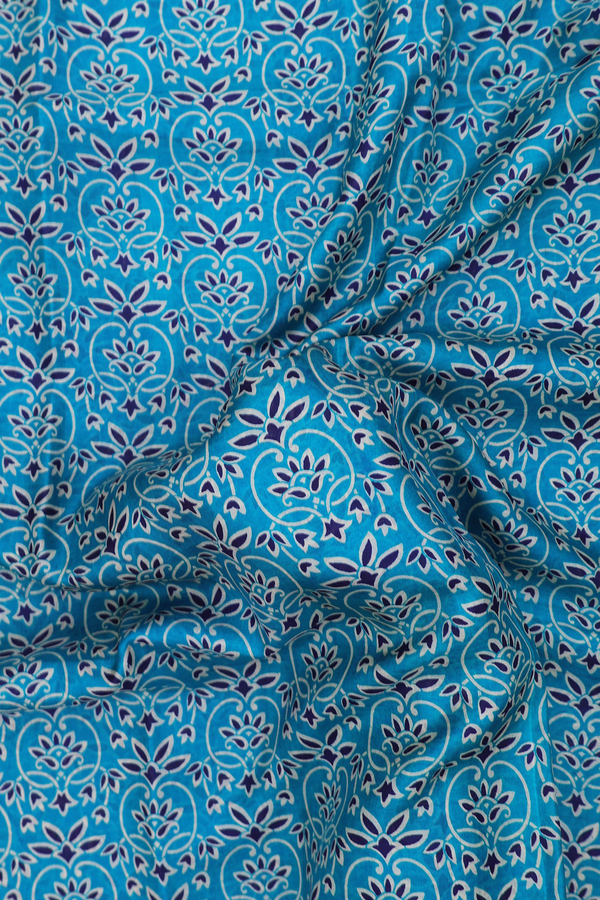Printed Silk Saree In Teal Blue With Allover Design