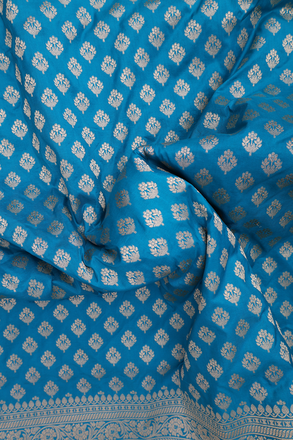 Banarasi Silk Saree In Cerulean Blue With Floral Buttas