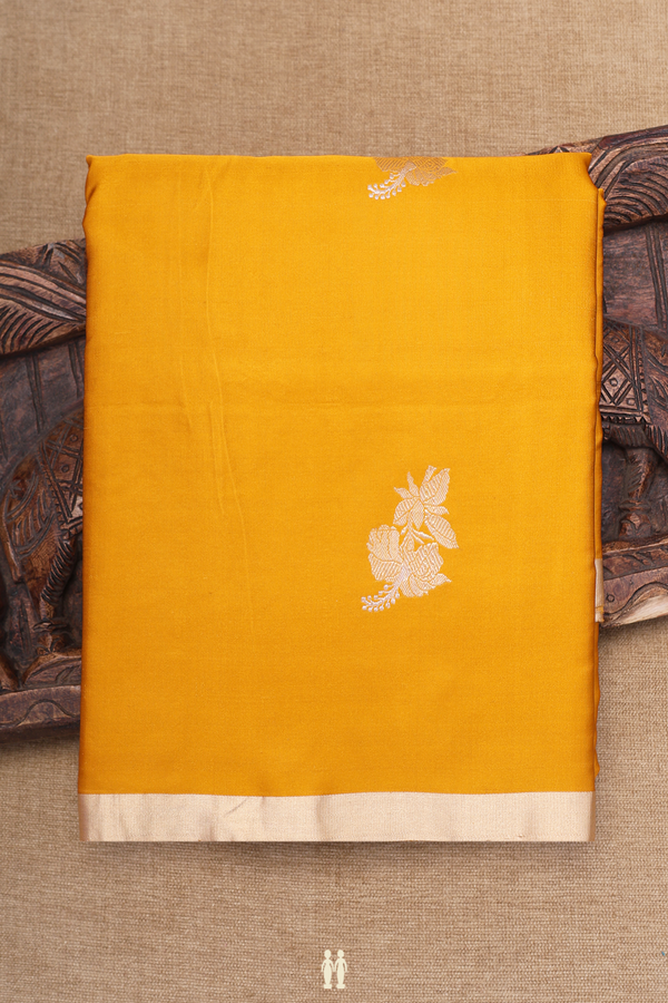 Banarasi Silk Saree In Mustard Yellow With Floral Buttas