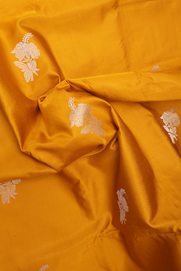 Banarasi Silk Saree In Mustard Yellow With Floral Buttas